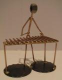 Bells Player Figurine